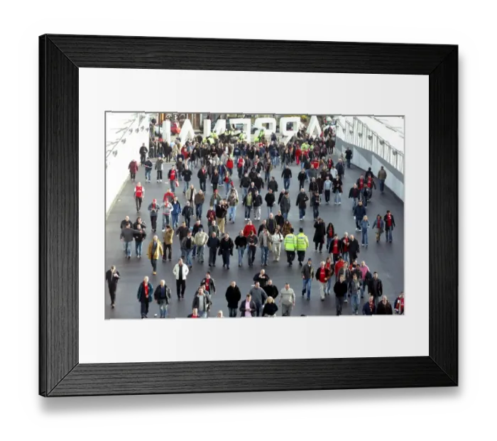 Framed Print : Fans use the Clock End Bridge to get to the stadium