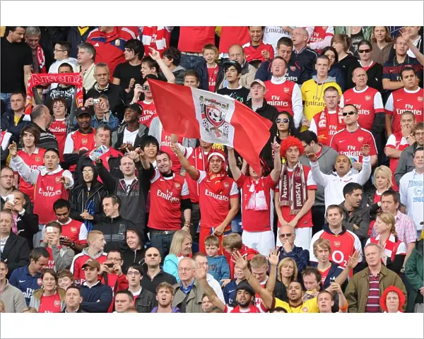 Arsenal fans celebrate the 1st goal scored by Theo Walcott. Blackburn Rovers 1: 2 Arsenal