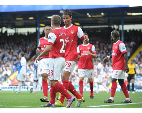 Arshavin and Chamakh: Celebrating a 2-1 Arsenal Lead Over Blackburn Rovers