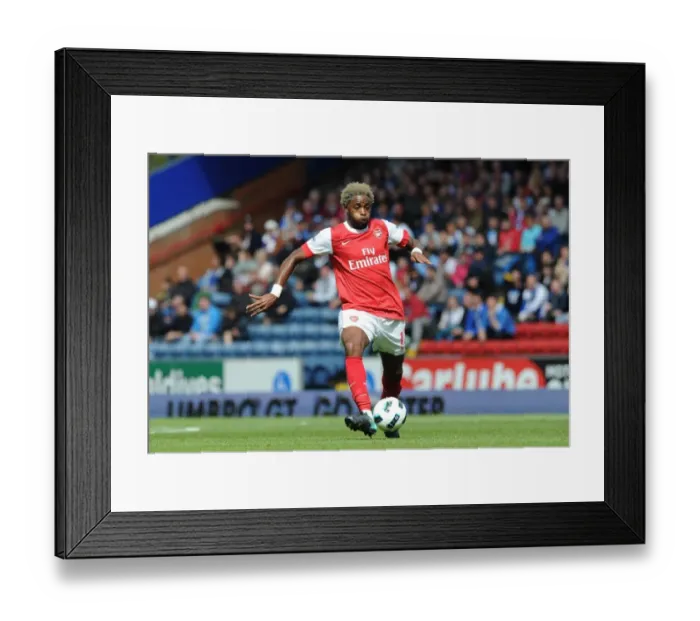 Framed Print : Alex Song's Brilliant Performance: Arsenal Triumphs Over Blackburn Rovers 2-1 in Premier League