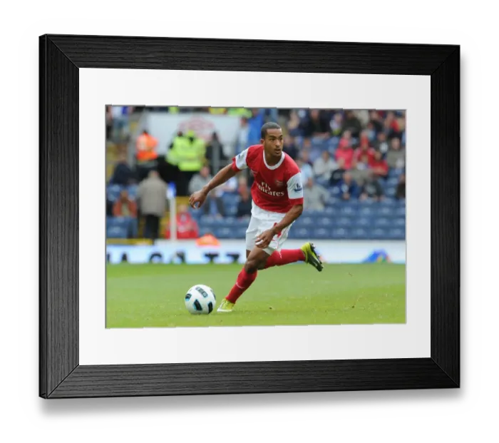Framed Print : Theo Walcott's Brilliant Performance: Arsenal's 2-1 Victory over Blackburn Rovers (2010-11) Framed Print : Theo Walcott's Brilliant Performance: Arsenal's 2-1 Victory over Blackburn Rovers (2010-11)