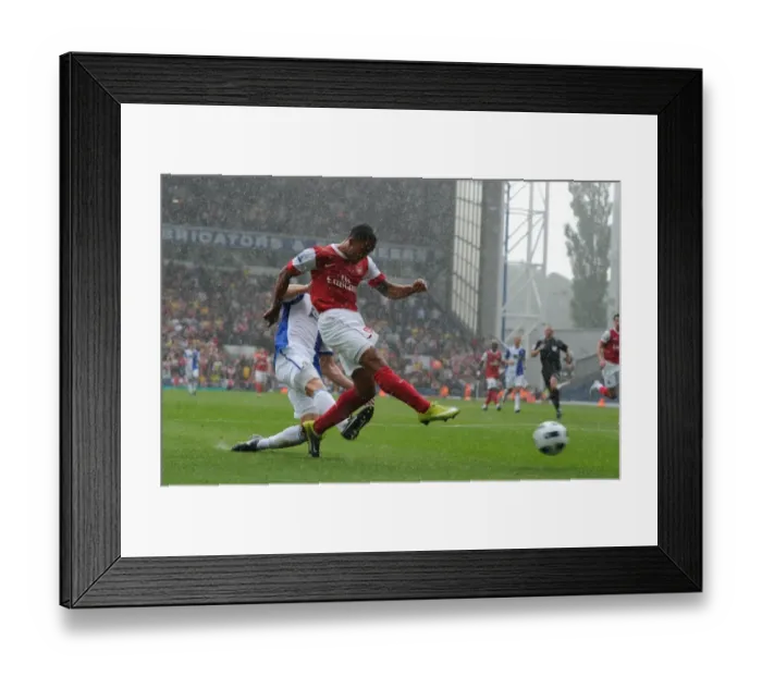 Framed Print : Theo Walcott shoots past Blackburn goalkeeper Paul Robinson to score the 1st Arsenal goal
