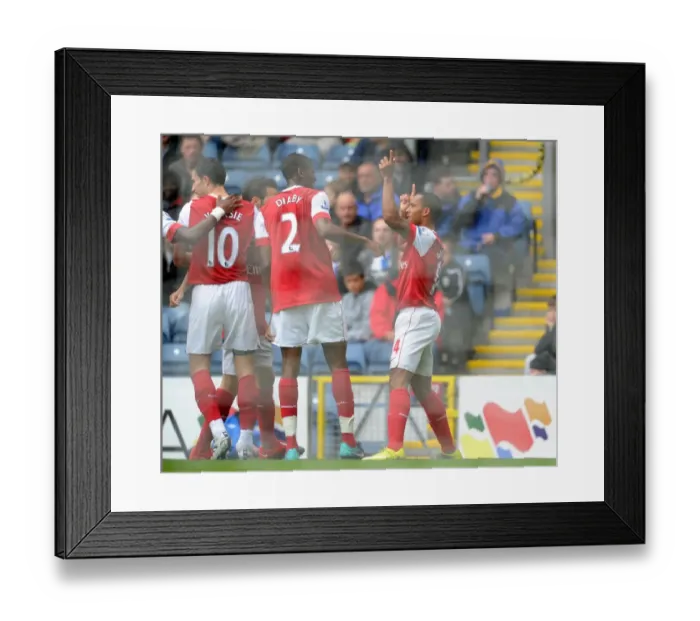 Framed Print : Theo Walcott's Historic Debut Goal: Arsenal's Win Against Blackburn Rovers (2010) - Celebrating with Diaby, Fabregas, and van Persie Framed Print : Theo Walcott's Historic Debut Goal: Arsenal's Win Against Blackburn Rovers (2010) - Celebrating with Diaby, Fabregas, and van Persie