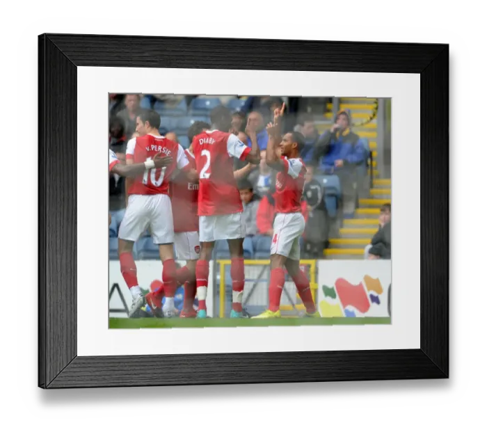 Framed Print : Theo Walcott celebrates scoring the 1st Arsenal goal with Abou Diaby, Cesc Fabregas Framed Print : Theo Walcott celebrates scoring the 1st Arsenal goal with Abou Diaby, Cesc Fabregas