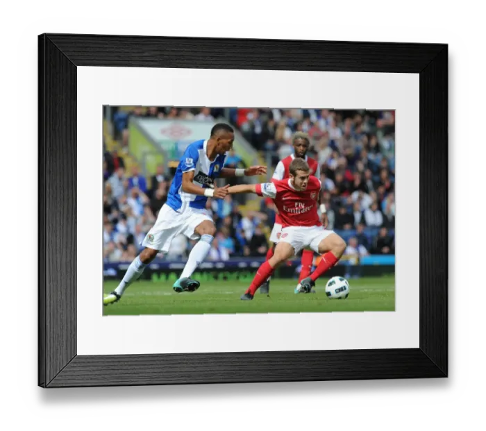 Framed Print : Jack Wilshere (Arsenal) Steven Nzonzi (Blackburn). Blackburn Rovers 1: 2 Arsenal Framed Print : Jack Wilshere (Arsenal) Steven Nzonzi (Blackburn). Blackburn Rovers 1: 2 Arsenal