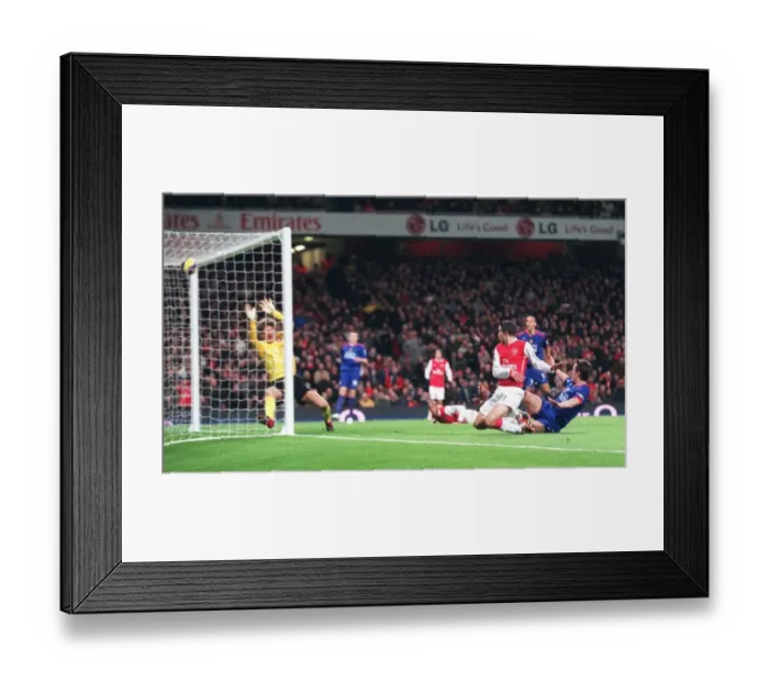 Framed Print : Robin van Persie's Thrilling Goal: Arsenal Takes the Lead Against Manchester United (2007) Framed Print : Robin van Persie's Thrilling Goal: Arsenal Takes the Lead Against Manchester United (2007)