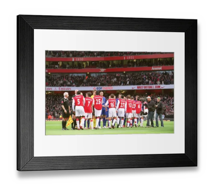 Framed Print : The Arsenal and Manchester United shake hands before the match Framed Print : The Arsenal and Manchester United shake hands before the match