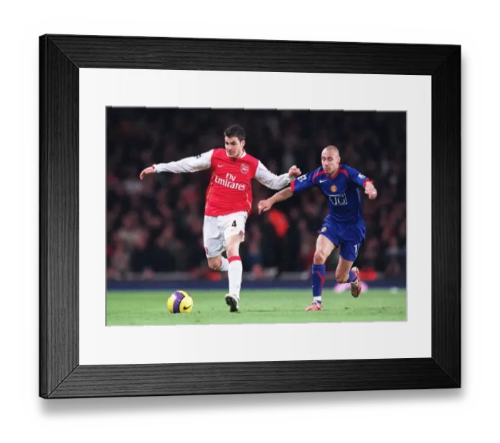 Framed Print : Cesc Fabregas (Arsenal) Henrik Larsson (Man Utd) Framed Print : Cesc Fabregas (Arsenal) Henrik Larsson (Man Utd)