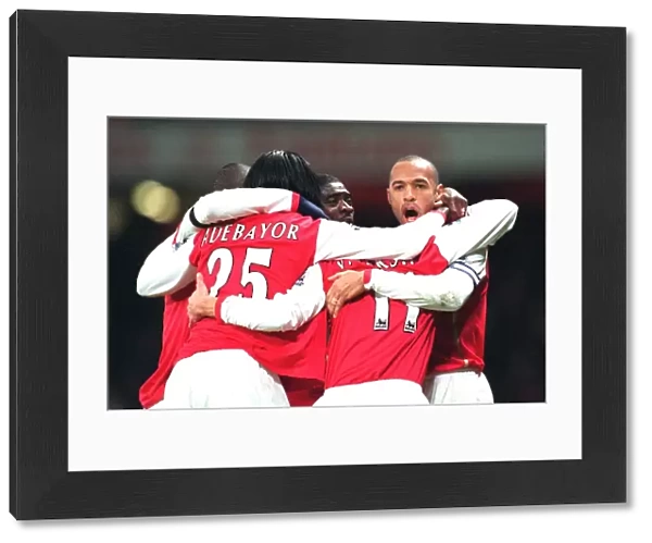 Robin van Persie celebrates scoring Arsenals 1st goal with Emmanuel Adebayor