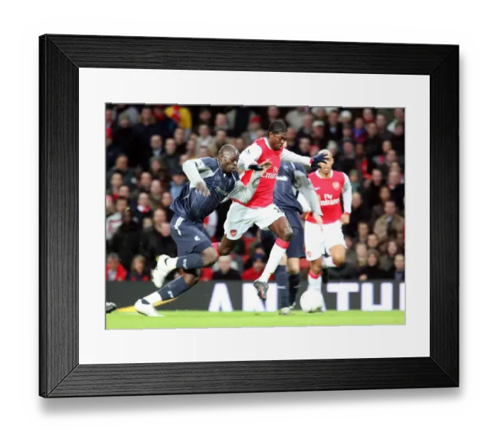 Framed Print : Emmauel Adebayor (Arsenal) Abdoulaye Faye (Bolton) Framed Print : Emmauel Adebayor (Arsenal) Abdoulaye Faye (Bolton)