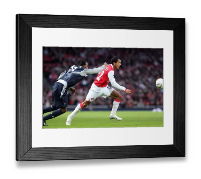 Framed Print : Theo Walcott vs. Ricardo Gardner: A FA Cup Battle at Emirates Stadium, Arsenal vs. Bolton Wanderers (1:1) Framed Print : Theo Walcott vs. Ricardo Gardner: A FA Cup Battle at Emirates Stadium, Arsenal vs. Bolton Wanderers (1:1)