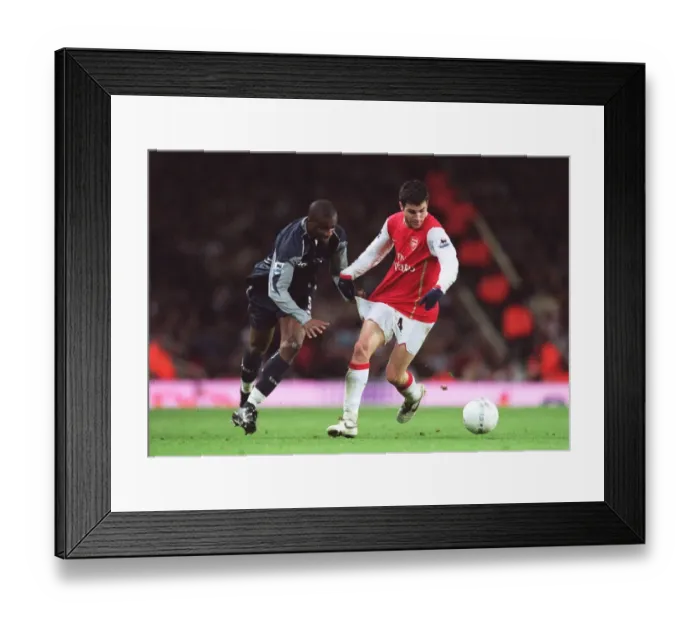 Framed Print : Fabregas vs. Meite: A 1-1 FA Cup Battle at Emirates Stadium (2007)