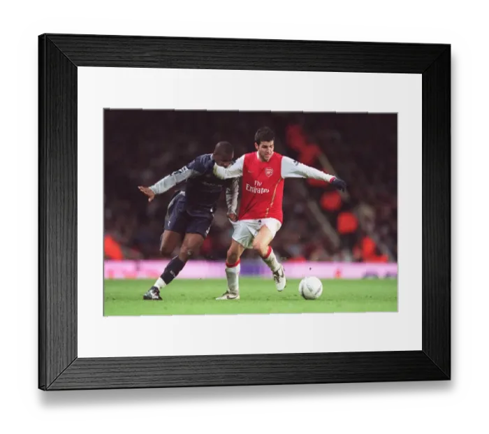 Framed Print : Fabregas vs. Meite: A 1-1 Battle in the FA Cup at Emirates Stadium (2007) Framed Print : Fabregas vs. Meite: A 1-1 Battle in the FA Cup at Emirates Stadium (2007)