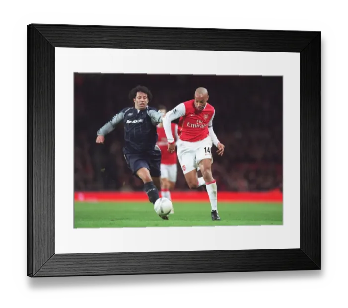 Framed Print : Thierry Henry (Arsenal) Ivan Campo (Bolton) Framed Print : Thierry Henry (Arsenal) Ivan Campo (Bolton)