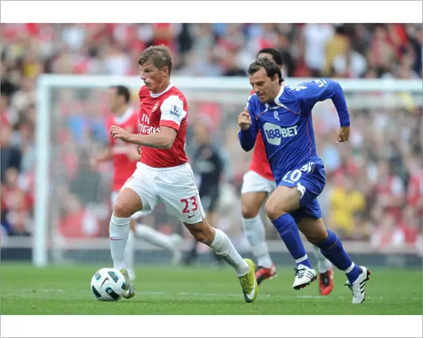 Andrey Arshavin (Arsenal) Robbie Blake (Bolton). Arsenal 4: 1 Blackburn Rovers