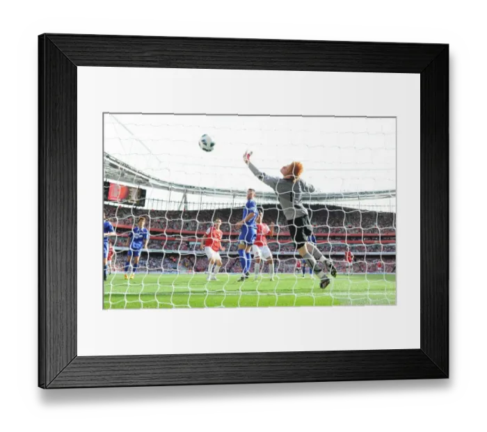Framed Print : Marouane Chamakh heads past Bolton goalkeeper Adam Bogdan to score the 2nd Arsenal goal
