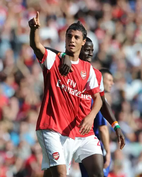 Chamakh and Eboue: Arsenal's Unstoppable Duo Celebrates 4-1 Victory Over Blackburn Rovers