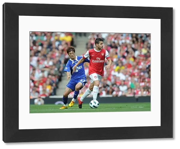 Cesc Fabregas (Arsenal) Chung-Yong Lee (Bolton). Arsenal 4: 1 Blackburn Rovers