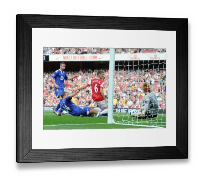 Framed Print : Koscielny's Stunner: Arsenal's First Goal vs. Bolton (4-1) Framed Print : Koscielny's Stunner: Arsenal's First Goal vs. Bolton (4-1)