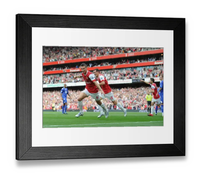Framed Print : Laurent Koscielny celebrates scoring the 1st Arsenal goal with Sebastien Squillaci