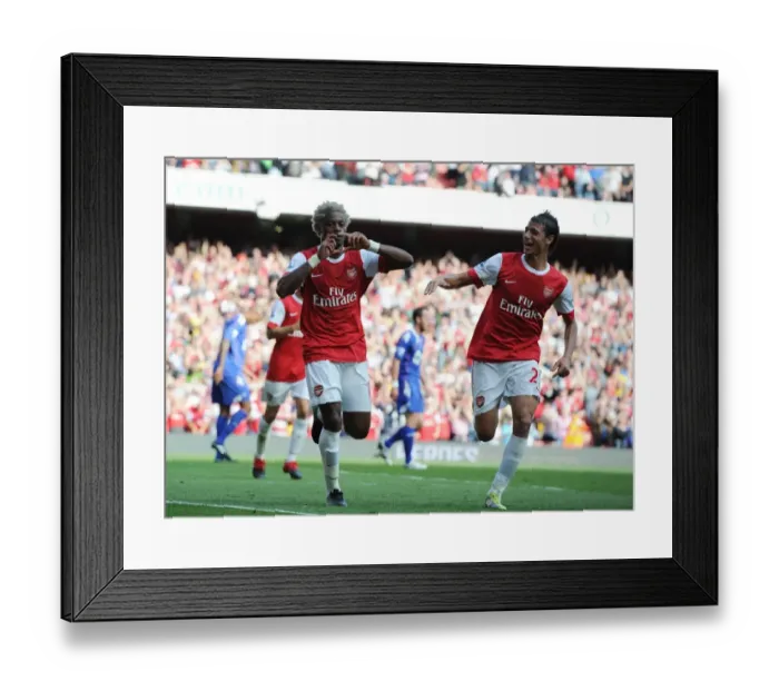 Framed Print : Alex Song celebrates scoring the 3rd Arsenal goal with Marouane Chamakh