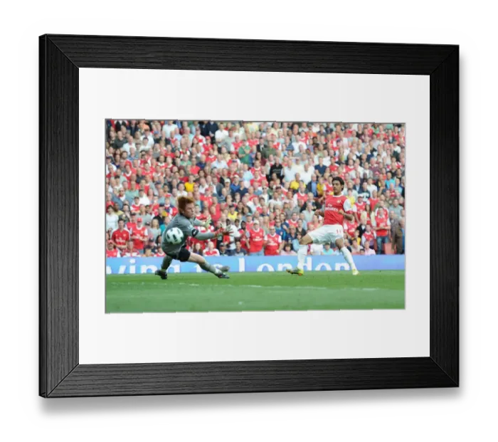 Framed Print : Carlos Vela shoots past Bolton goalkeeper Adam Bogdan to score the 4th Arsenal goal Framed Print : Carlos Vela shoots past Bolton goalkeeper Adam Bogdan to score the 4th Arsenal goal