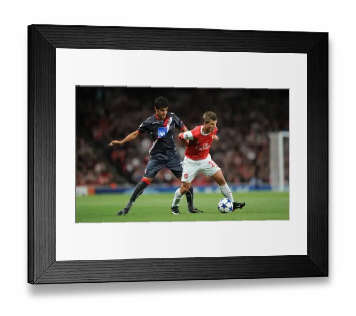 Framed Print : Andrey Arshavin (Arsenal) Luis Aguiar (Braga). Arsenal 6: 0 SC Braga, UEFA Champions League Framed Print : Andrey Arshavin (Arsenal) Luis Aguiar (Braga). Arsenal 6: 0 SC Braga, UEFA Champions League