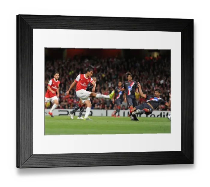 Framed Print : Marouane Chamakh shoots past Braga goalkeeper Felipe to score the 3rd Arsenal goal