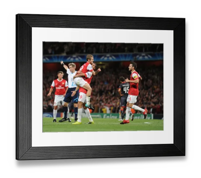 Framed Print : Chamakh's Hat-Trick: Arsenal's Impressive 6-0 Victory over SC Braga with Jack Wilshere and Cesc Fabregas Framed Print : Chamakh's Hat-Trick: Arsenal's Impressive 6-0 Victory over SC Braga with Jack Wilshere and Cesc Fabregas