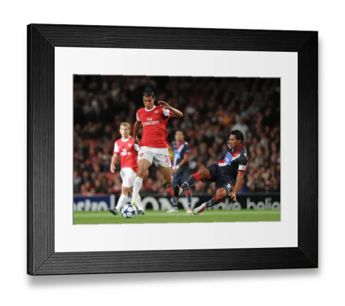 Framed Print : Marouane Chamakh (Arsenal) Vandinho (Braga). Arsenal 6: 0 SC Braga, UEFA Champions League