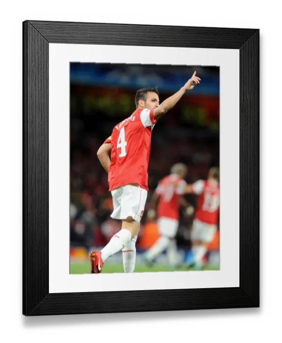 Framed Print : Cesc Fabregas celebrates scoring the 4th Arsenal goal. Arsenal 6: 0 SC Braga