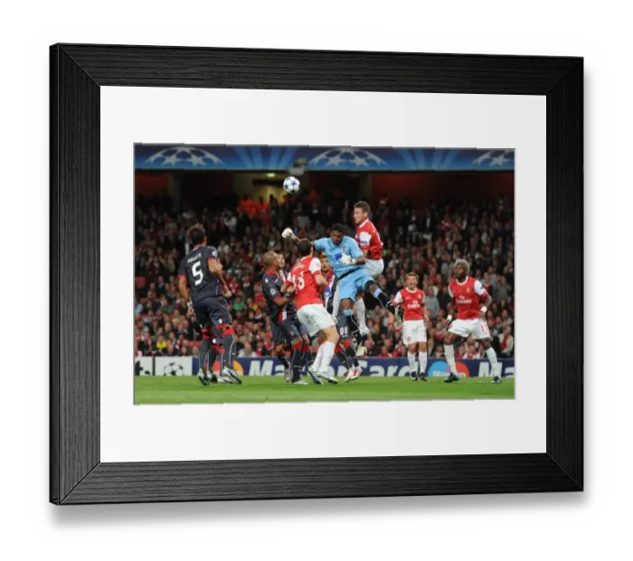 Framed Print : Laurent Koscielny (Arsenal) Felipe (Braga). Arsenal 6: 0 SC Braga, UEFA Champions League