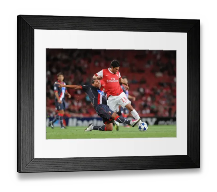 Framed Print : Carlos Vela (Arsenal) Lima (Braga). Arsenal 6: 0 SC Braga, UEFA Champions League