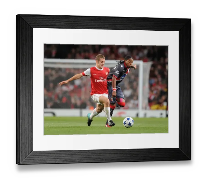 Framed Print : Jack Wilshere (Arsenal) Alan (Braga). Arsenal 6: 0 SC Braga, UEFA Champions League