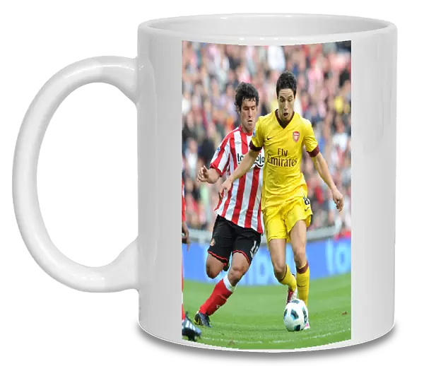 Samir Nasri (Arsenal) Cristian Riveros (Sunderland). Sunderland 1: 1 Arsenal