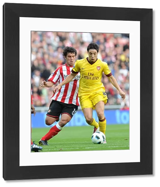 Samir Nasri (Arsenal) Cristian Riveros (Sunderland). Sunderland 1: 1 Arsenal