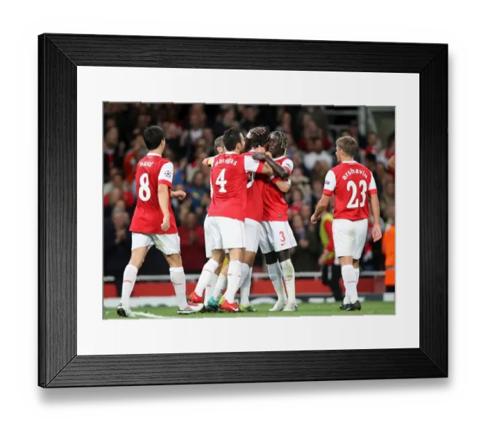 Framed Print : Marouane Chamakh celebrates scoring Arsenals 3rd goal with Bacary Sagna