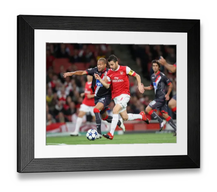 Framed Print : Cesc Fabregas (Arsenal) Alberto Rodriguez (Braga). Arsenal 6: 0 SC Braga
