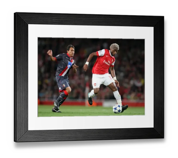 Framed Print : Alex Song (Arsenal) Mossoro (Braga). Arsenal 6: 0 SC Braga. UEFA Champions League