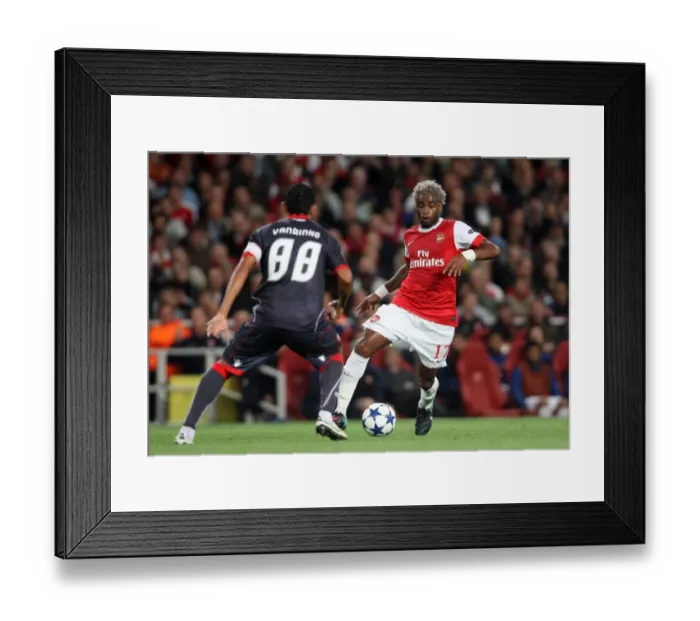 Framed Print : Alex Song (Arsenal) Vandinho (Braga). Arsenal 6: 0 SC Braga. UEFA Champions League