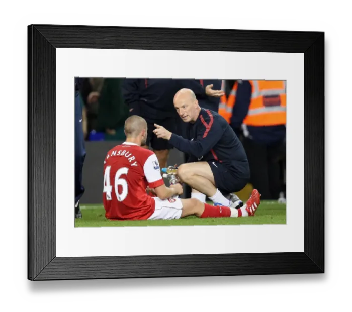 Framed Print : JK talks to Henri Lansbury (Arsenal) during the break before extra time Framed Print : JK talks to Henri Lansbury (Arsenal) during the break before extra time