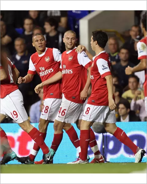 Henri Lansbury celebrates scoring Arsenals 1st goal with Kieran Gibbs