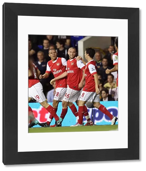 Henri Lansbury celebrates scoring Arsenals 1st goal with Kieran Gibbs