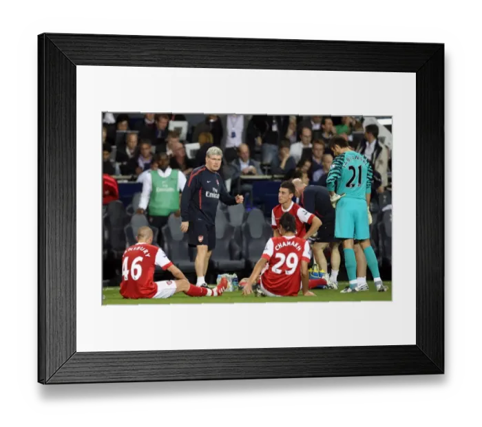 Framed Print : Pat Rice (Assistant Manager) talks to the players before the start of extra time Framed Print : Pat Rice (Assistant Manager) talks to the players before the start of extra time