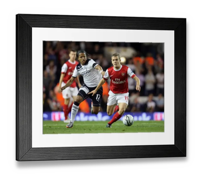 Framed Print : Jack Wilshere vs. Giovani Dos Santos: Arsenal's Triumph over Tottenham in the Carling Cup (1:4) Framed Print : Jack Wilshere vs. Giovani Dos Santos: Arsenal's Triumph over Tottenham in the Carling Cup (1:4)