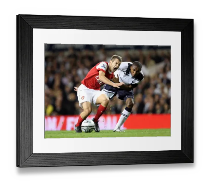 Framed Print : Jack Wilshere's Dominance: Arsenal's 4-1 Win Over Tottenham in Carling Cup (2010) Framed Print : Jack Wilshere's Dominance: Arsenal's 4-1 Win Over Tottenham in Carling Cup (2010)