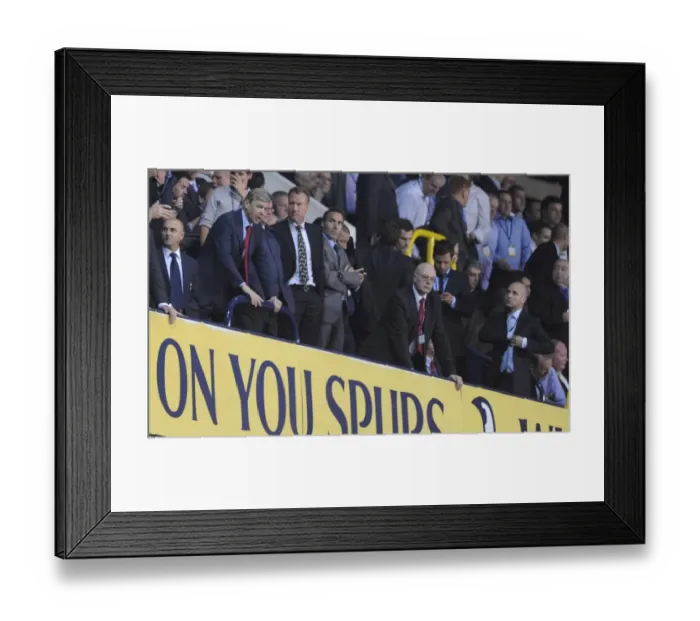 Framed Print : Arsenal manager Arsene Wenger in the directors box during the match. Tottenham Hotspur 1