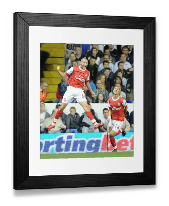 Framed Print : Henri Lansbury's Stunner: Arsenal's Dominant 4-1 Comeback Over Tottenham in Carling Cup Framed Print : Henri Lansbury's Stunner: Arsenal's Dominant 4-1 Comeback Over Tottenham in Carling Cup