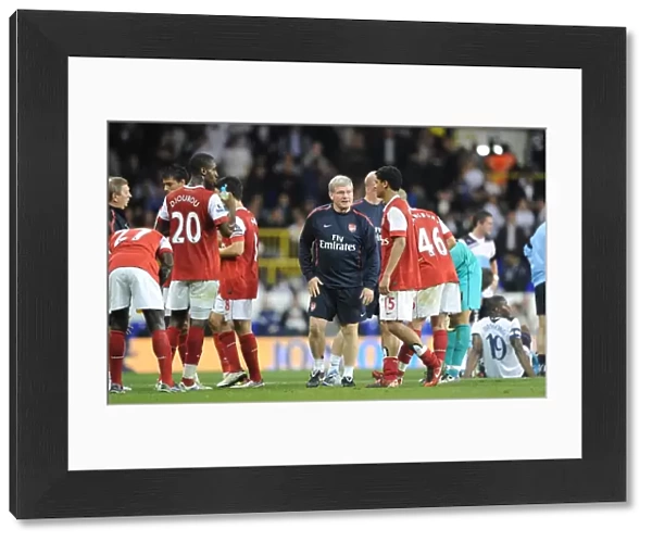 Arsenal assistant manager Pat Rice talks to the players before extra time