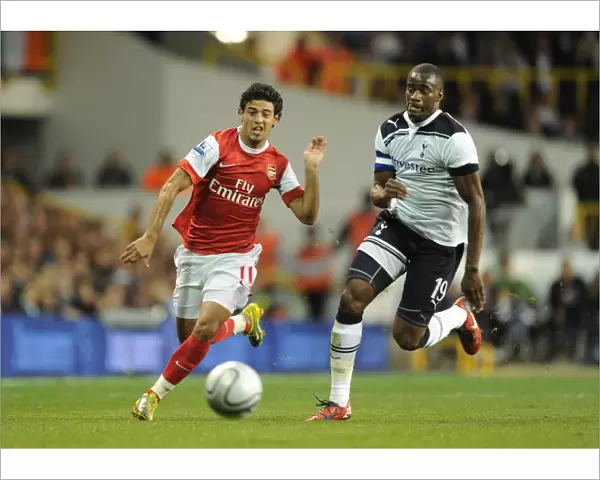 Carlos Vela (Arsenal) Sebastien Bassong (Tottenham). Tottenham Hotspur 1: 4 Arsenal (aet)